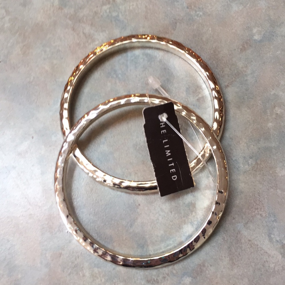 The limited silver tone bangles